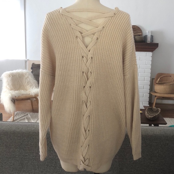 Sweaters - Dreamers knit cardigan with back lace up detail.
